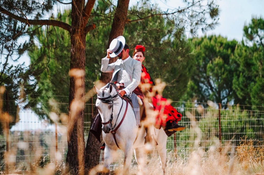 El Rocio Saca de las Yeguas people on horses Pilgrimage